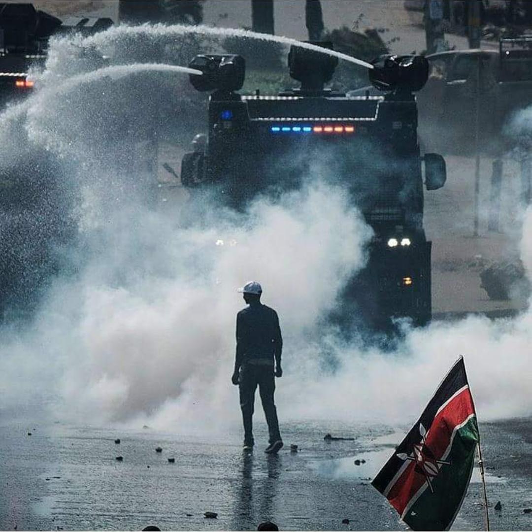 vvsa - lone protester amidst water cannon vvsa - lone protester amidst water cannon